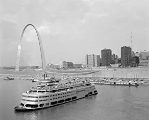 Posterazzi 1960s St. Louis Missouri Gateway Arch Skyline Mississippi River Ss Admiral Casino and Other Riverboats Poster Print by Vintage